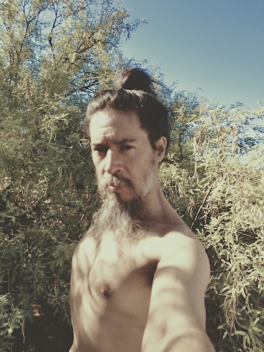 Ahgamen oriental martial artist look posing natural outdoors